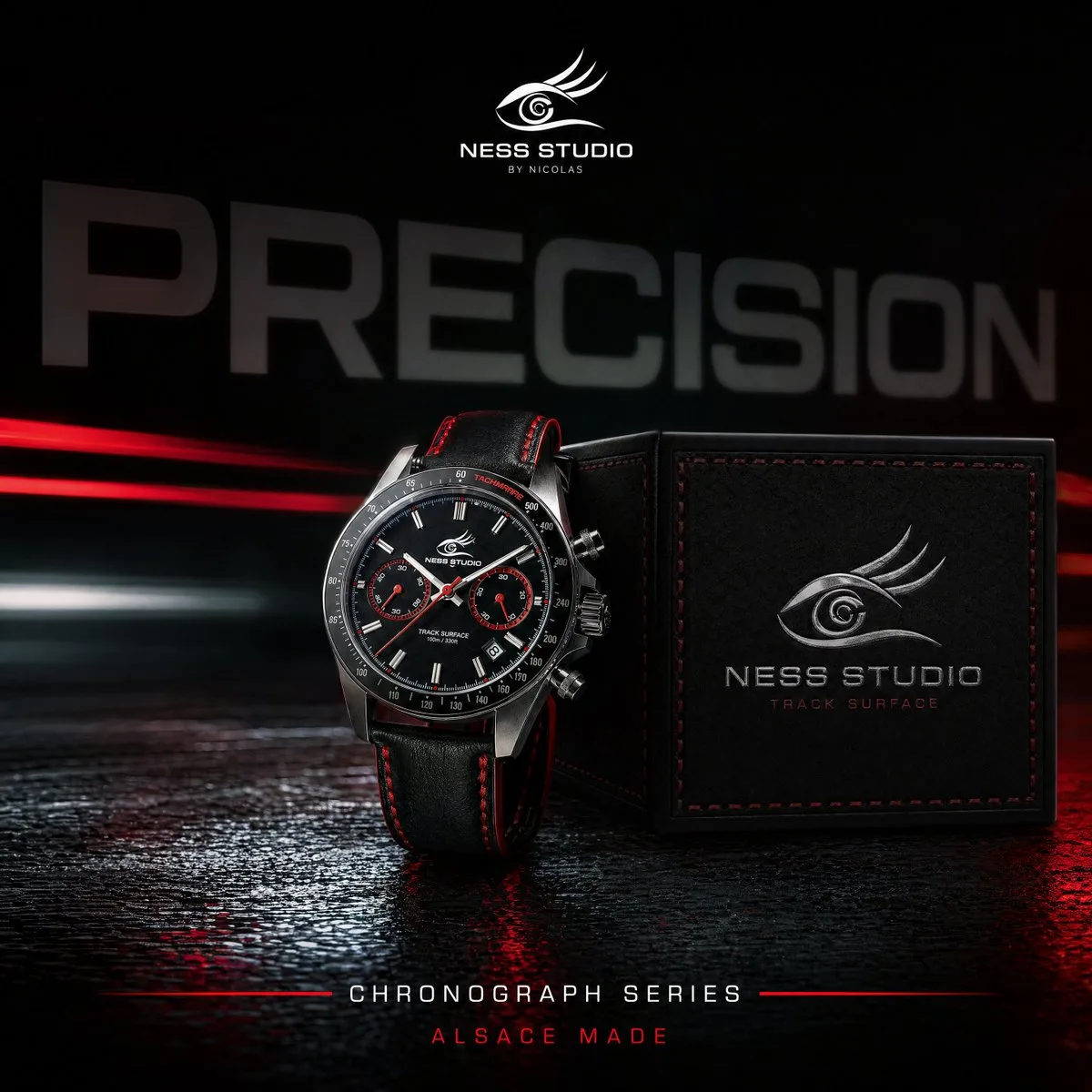 Luxury stainless steel chronograph watch with red stitching on a reflective studio surface.