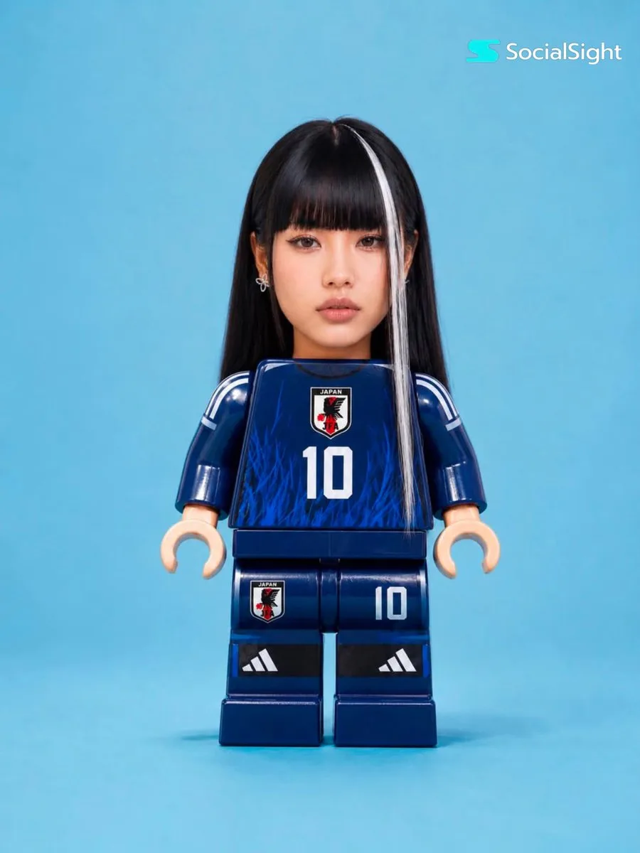 A detailed collectible soccer minifigure with a realistic face standing in a studio. (3)