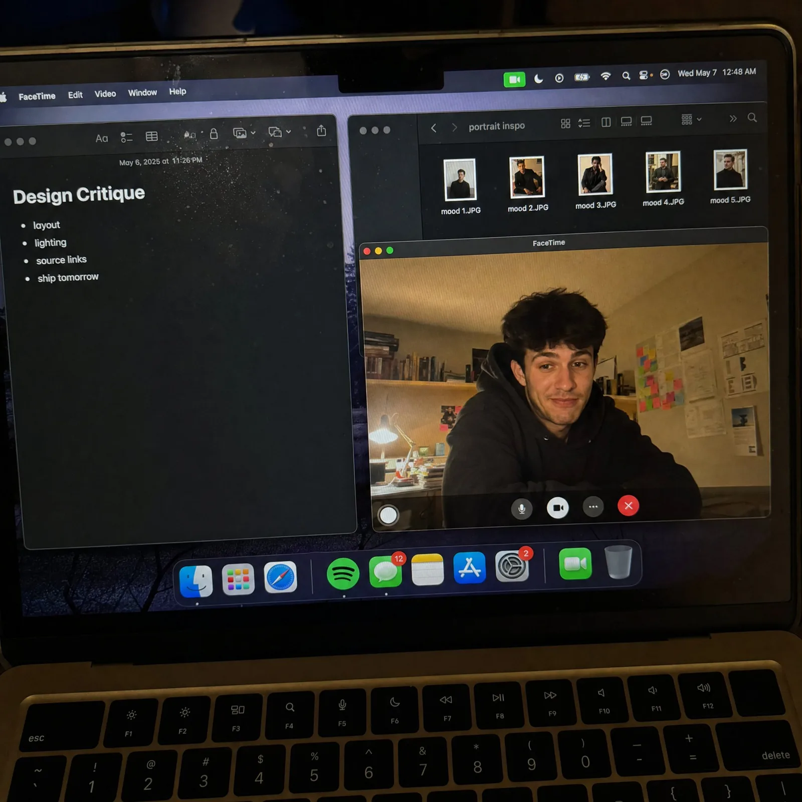 Realistic photo of a laptop screen with study notes and FaceTime preview.